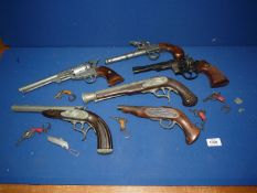 A quantity of replica pistols, revolvers, etc.