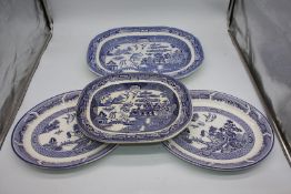 Four blue and white willow meat plates including Arklow, Ireland.