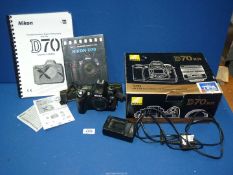 A Nikon D70 Digital SLR Camera body with battery, charger, box, Nikon guidebook and PIP guidebook,