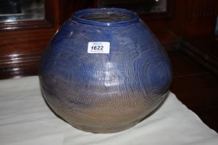 A heavy blue to beige Studio Pottery rounded vase with concentric circle pattern,