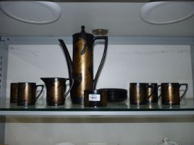 A six piece Portmeirion, Phoenix design coffee set.
