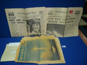 Three July '69 'Moon Landing' newspapers.