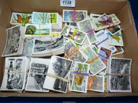 A box of Senior Service cigarette cards, plus a quantity of Brooke Bond cards.