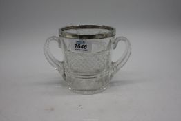 A cut glass ice Bucket with silver band around the rim and a drainer (a/f), London 1912.