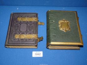 Two Victorian embossed leather and gilt metal mounted photograph albums,
