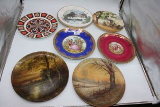 A quantity of wall plates to include; Royal Doulton 'Family Day Out', 'Adler' Bavaria, etc.