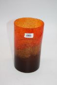 A Monart glass Vase in mottled shades of orange and brown, 5 1/2" diameter x 9 1/2" high.