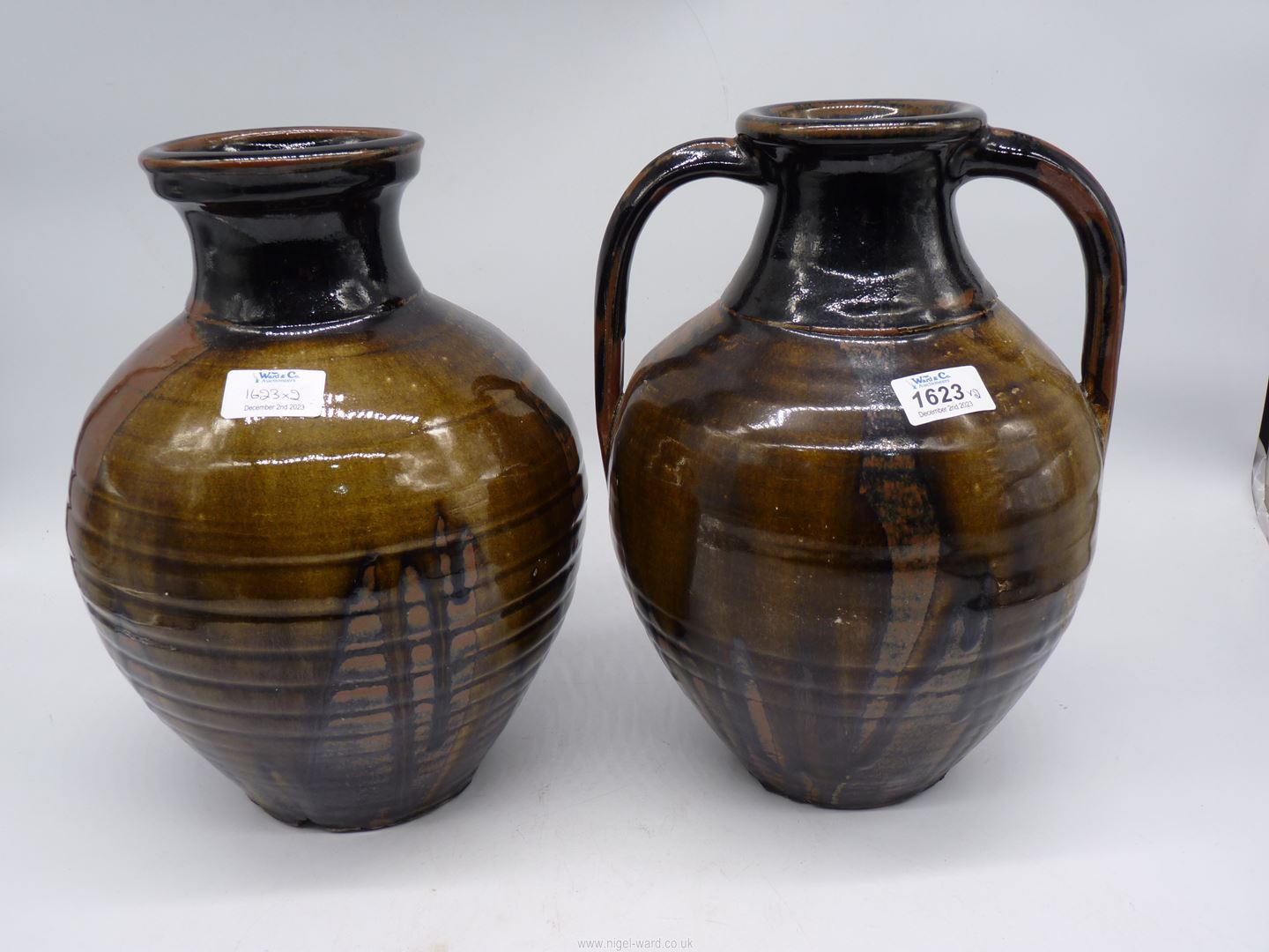 Two Studio Pottery vases, one with handles in black, russet and olive green drip glaze, - Image 2 of 15