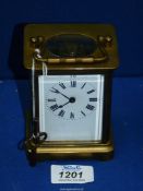 A Brass carriage Clock with key.