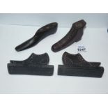 Four carved Welsh slate model Shoes, largest 5", comprising of a pair of mantle ornaments,