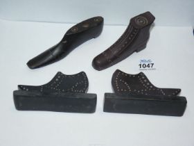 Four carved Welsh slate model Shoes, largest 5", comprising of a pair of mantle ornaments,