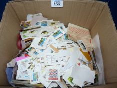 A box of loose stamps including English and foreign.