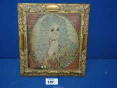 An old tapestry picture in original frame of King George, some fading, 6" x 7" excl. frame.