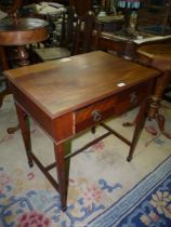 A Satinwood and Mahogany side Table standing on tapering square legs terminating in spade feet and
