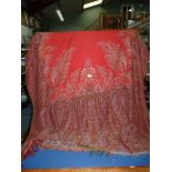 A Victorian paisley Shawl/throw, 128" long x 60" wide (some holes present).