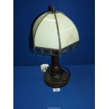 A Tiffany style lamp with plain cream shade, 19" tall.
