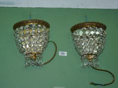 Two chandelier style glass wall lights with mirror backs, 8 3/4'' high approx.