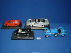 Three Burago model cars to include; Ferrari F40 1987, Bugatti, Lamborghini Countach 5000 1988,