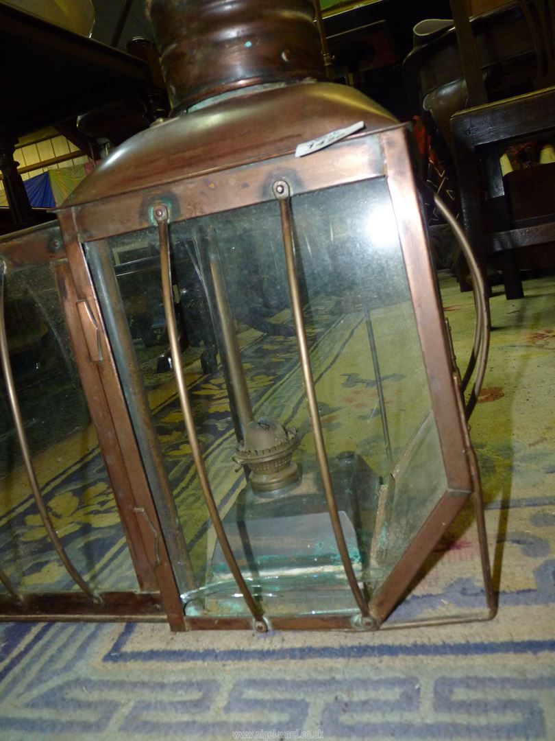 A copper oil lantern by Ansell Jones & Co, Birmingham, one pne cracked, 21'' high x 9'' x 9 1/2''. - Image 2 of 3