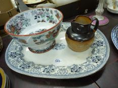 A blue & white meat plate, Doulton Lambeth jug and an Oriental style footed bowl.