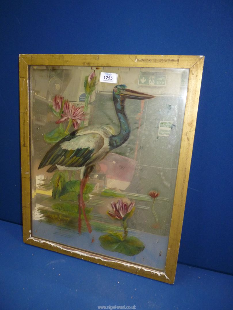 A gilt framed Mirror with a hand painted design of a crane standing in a lake with lily pads,