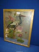 A gilt framed Mirror with a hand painted design of a crane standing in a lake with lily pads,