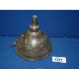 An 18th century pewter funnel.