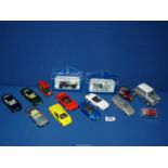 A quantity of toy cars including; two boxed Rolls Royce, etc.