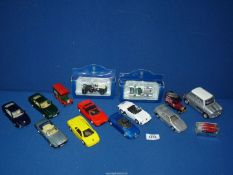 A quantity of toy cars including; two boxed Rolls Royce, etc.