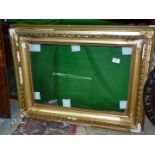 A large period gilt frame with glass, some restoration needed,