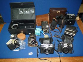 A quantity of old Cameras including a Kodak Brownie Model I, Two Halina 3000 35mm Cameras,