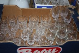 A quantity of cut glass to include; whiskey glasses, sherry glasses, wine glasses, etc.