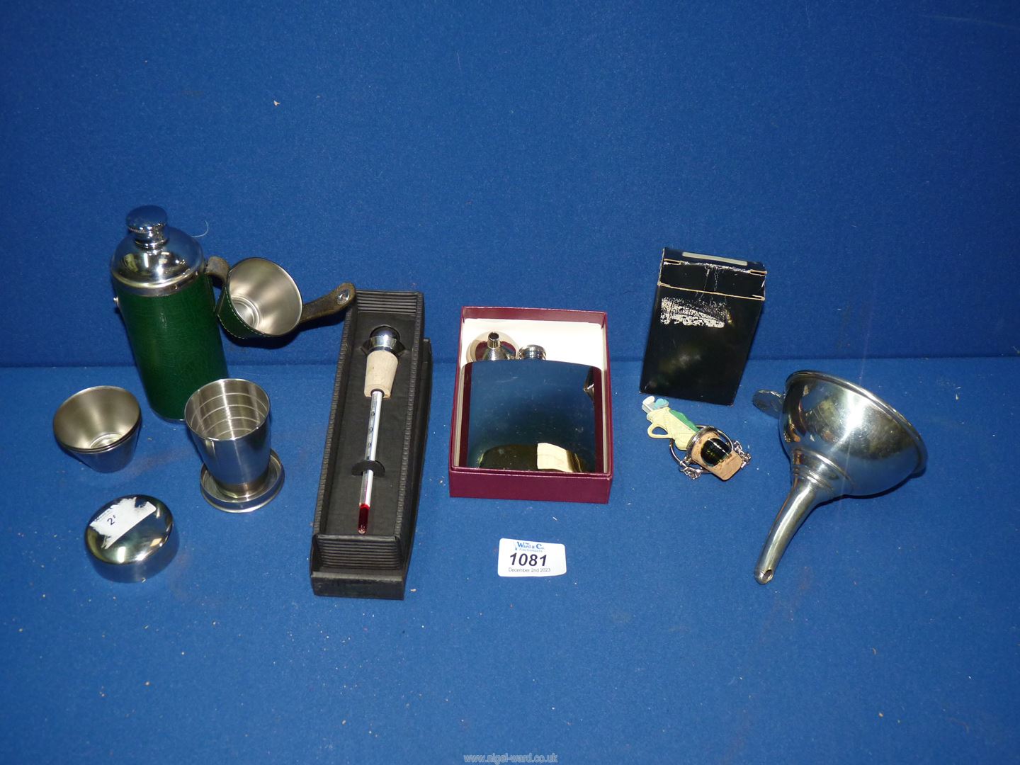 A small quantity of miscellanea to include; stainless steel hip flask and funnel,