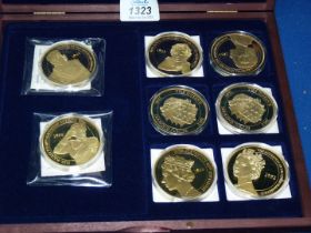 Eight Windsor Mint ''Portraits of the Queen''; gold plated,