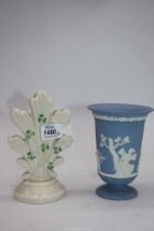 A Belleek branch posy vase decorated Shamrock, 7" tall and a Wedgwood Jasperware blue vase,