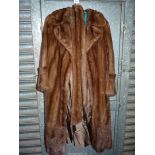 A full length Mink coat by Regency Furs.