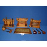 Four wooden pipe racks and twelve briar and rustic smoking Pipes to include: Falcon, Trident,
