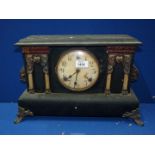 A classical style wooden mantle clock, 17'' wide x 11'' high x 5 1/2' deep.