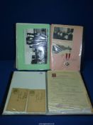 A quantity of WWI German ephemera including documents, medals, certificates, etc. (two folders).