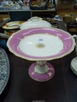 A Copeland Cake stand with pink and gilt borders.