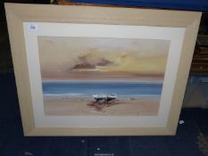 A large framed and mounted Print of a seascape with two boats beached, no visible signature.