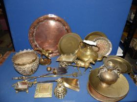 A large quantity of brass and copper including plates, teapot, horse and cart, jardiniere, urn, etc.