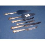 A small quantity of silver handled cutlery, cake slices, cheese knives, etc., Sheffield.
