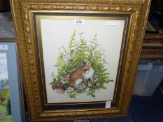 An ornate gilt framed original painting of a vixen and two cubs by Ben Mitchell (young Bristol