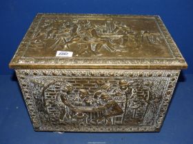 A brass embossed slipper box, embossed with tavern scenes.