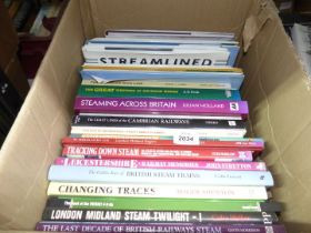 A box of train books including Steaming across Britain, The Coastlines of The Cambrian Railways,