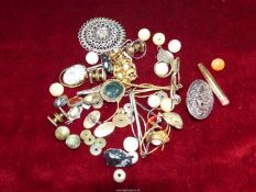 A small quantity of jewellery including scarf rings, tie clips, cufflinks, beads, etc.