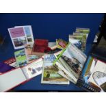 A crate of railway and post card albums, dvd's, books, etc.