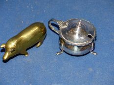 A silver plated mustard pot with glass liner and a brass pig.