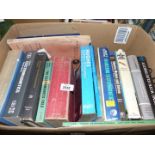 A box of books on electronics including Electromagnetic Fields and Energy, Fishing with Electricity,